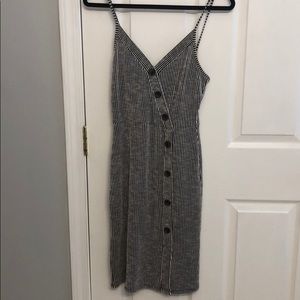 Black and white striped fitted dress with buttons